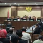 Ahli hukum pidana Universitas Gadjah Mada (UGM) Muhammad Fatahillah Akbar saat dihadirkan sebagai saksi dalam sidang dugaan suap dan perintangan penyidikan yang menjerat Sekretaris Jenderal PDI-P Hasto Kristiyanto di Pengadilan Tipikor Jakarta Pusat, Kamis